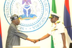 L-R: President Bola Ahmed Tinubu, Decorating the Newly appointed Chief of Army Staff, Lieutenant General Waidi Shaibu, at the Presidential Villa Abuja