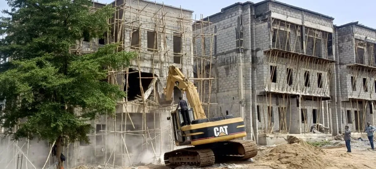FCTA demolishes 11 illegal duplexes built near high-tension lines and stream