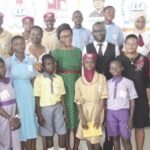 Bilewu, Esiri, Taofeek and Onuorah with schoool children at the event