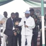 Dr. Alausa handing over car key to Solanke