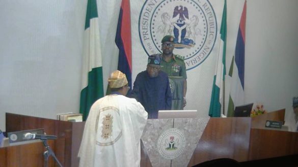 INEC Chairman Joash Amupitan being sworn-in by President Bola Tinubu