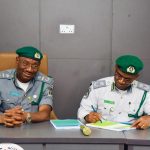 Olomu-hand-over-1