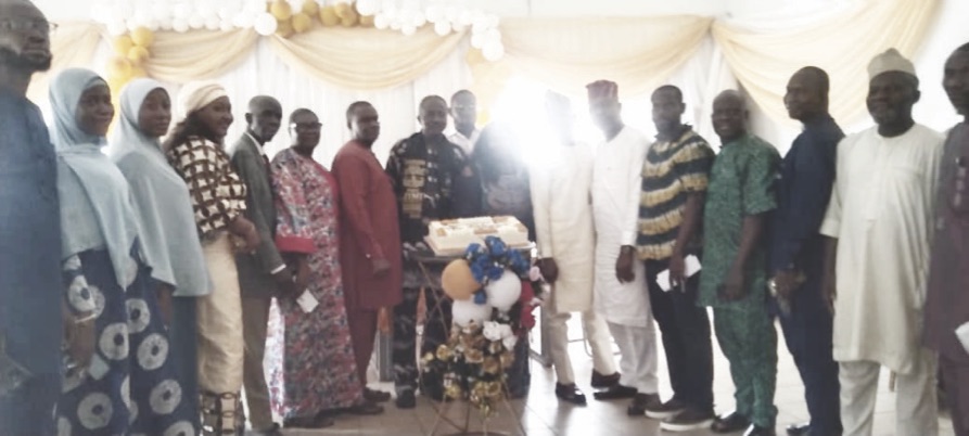 Prof Kayode and wife (middle), Prof. Jide and faculty staff