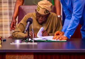 Tinubu signs