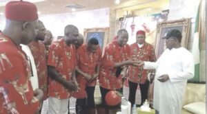 Umahi presenting vehicle keys to AYF leaders