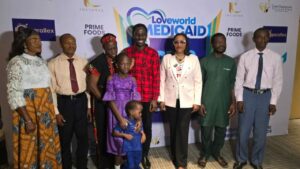 Assistant Director Loveworld Medicaid,  Dr Jumoke Ola-Akisanya (3rd R) with the beneficiaries of the V.I.S.I.O.N.10,000 FREE EYE SURGERIES