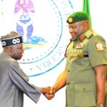 L-R: President Bola Ahmed Tinubu, Decorating the Newly appointed Chief of Defence Staff, General Olufemi Olatubosun Oluyede, at the Presidential Villa Abuja