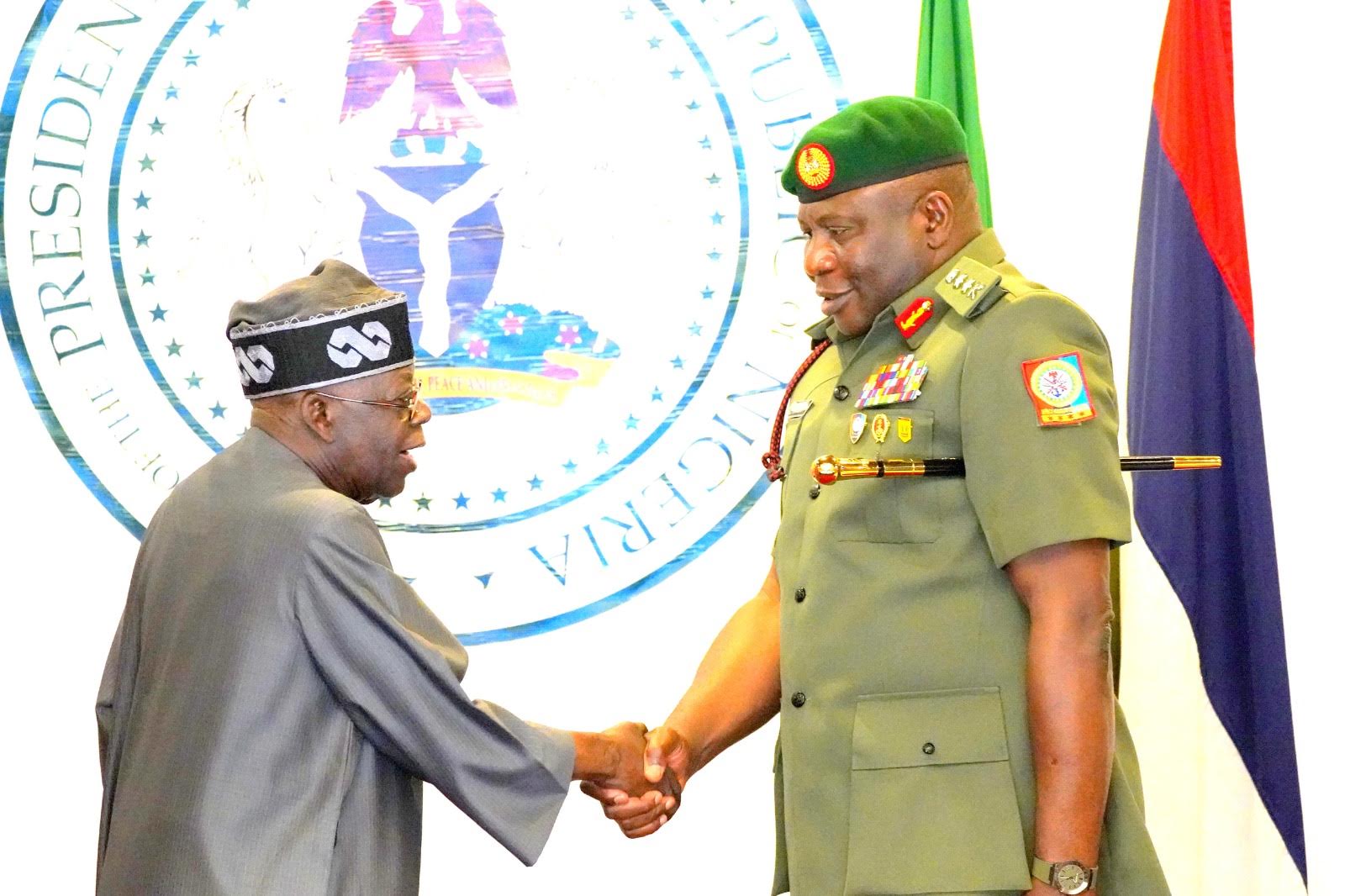 L-R: President Bola Ahmed Tinubu, Decorating the Newly appointed Chief of Defence Staff, General Olufemi Olatubosun Oluyede, at the Presidential Villa Abuja