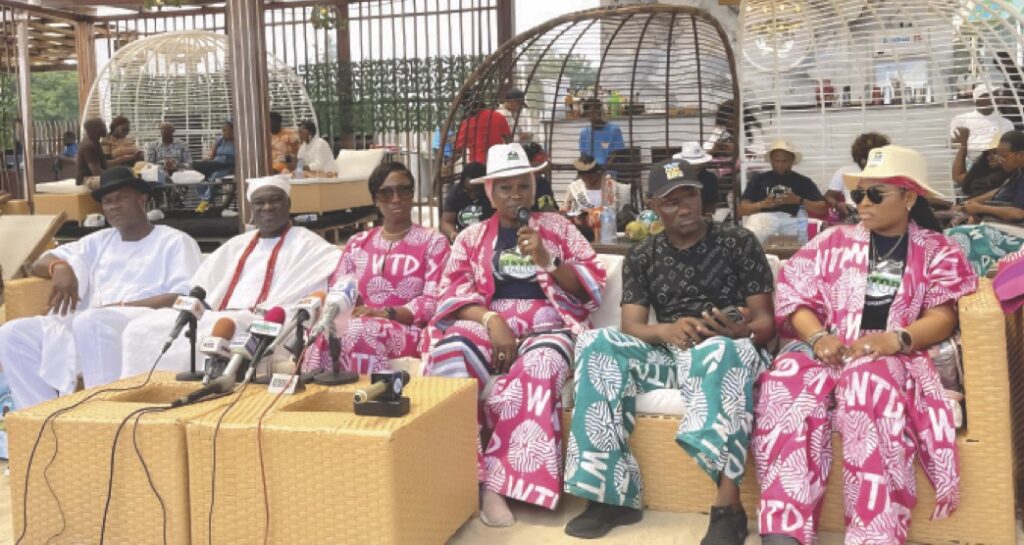 • Hajia Bolaji Mustapha (fourth from left) with other guests during the World Tourism Day celebration in Tarkwa Bay Lagos