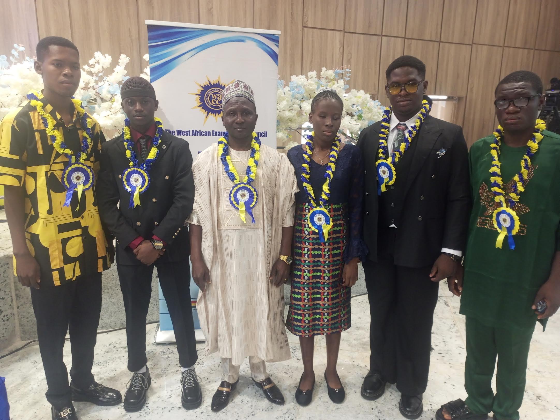 WAEC Head of National Office Dr. Amos Dangut with some of the winners