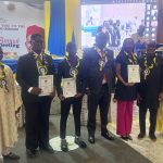 WAEC Head of National Office, Dr. Amos Dangut (left), Abia Education Commissioner,  Goodluck Ubochi and WASSCE awardees at NNC event