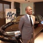 Toyota Nigeria Ltd Managing Director, Mr. Kunle Ade-Ojo, introducing a Toyota car