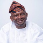 Dr Muyiwa Aina