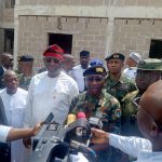 Chief of Naval Staff (CNS) Vice Admiral Idi Abbas flanked by the Deputy Governor of Blue State, Barr. Sam Ode during the visit