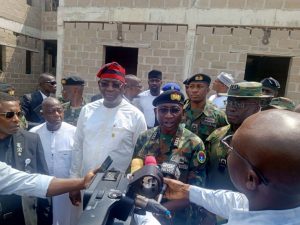 Chief of Naval Staff (CNS) Vice Admiral Idi Abbas flanked by the Deputy Governor of Blue State, Barr. Sam Ode during the visit