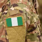 Nigeria,Flag,On,Soldiers,Arm.,Federal,Republic,Of,Nigeria,Troops
