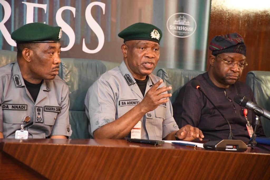 Comptroller General of Nigeria Customs Service, Adewale Adeniyi (middle) with Special Adviser to the President on Media and Public Communication, Sunday Dare at the press briefing in the State House on Friday, November 14, 2025
