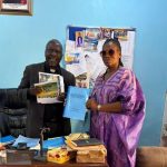Senior Special Assistant on Community Engagement for the North Central Zone, Abiodun Essiet with Chairman of the Regional Church Council, Reverend Ezekiel Dachomo, during the peace talk community engagement recently in Plateau State