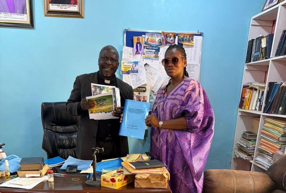 Senior Special Assistant on Community Engagement for the North Central Zone, Abiodun Essiet with Chairman of the Regional Church Council, Reverend Ezekiel Dachomo, during the peace talk community engagement recently in Plateau State