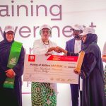 L-R: Wife of the Chief of Staff, Salamatu Gbajabiamila, Wife of Vice President, Nana Shettima, First Lady, Oluremi Tinubu (m), Director-General Kashifu Abdullahi and wife of the Imo State Governor, Chioma Uzodimma, handing a cheque to one of the beneficiaries of the 2025 Women ICT Training Empowerment Programme, an initiative of the National Information Technology Development Agency (NITDA) in collaboration with the Renewed Hope Initiative (RHI)