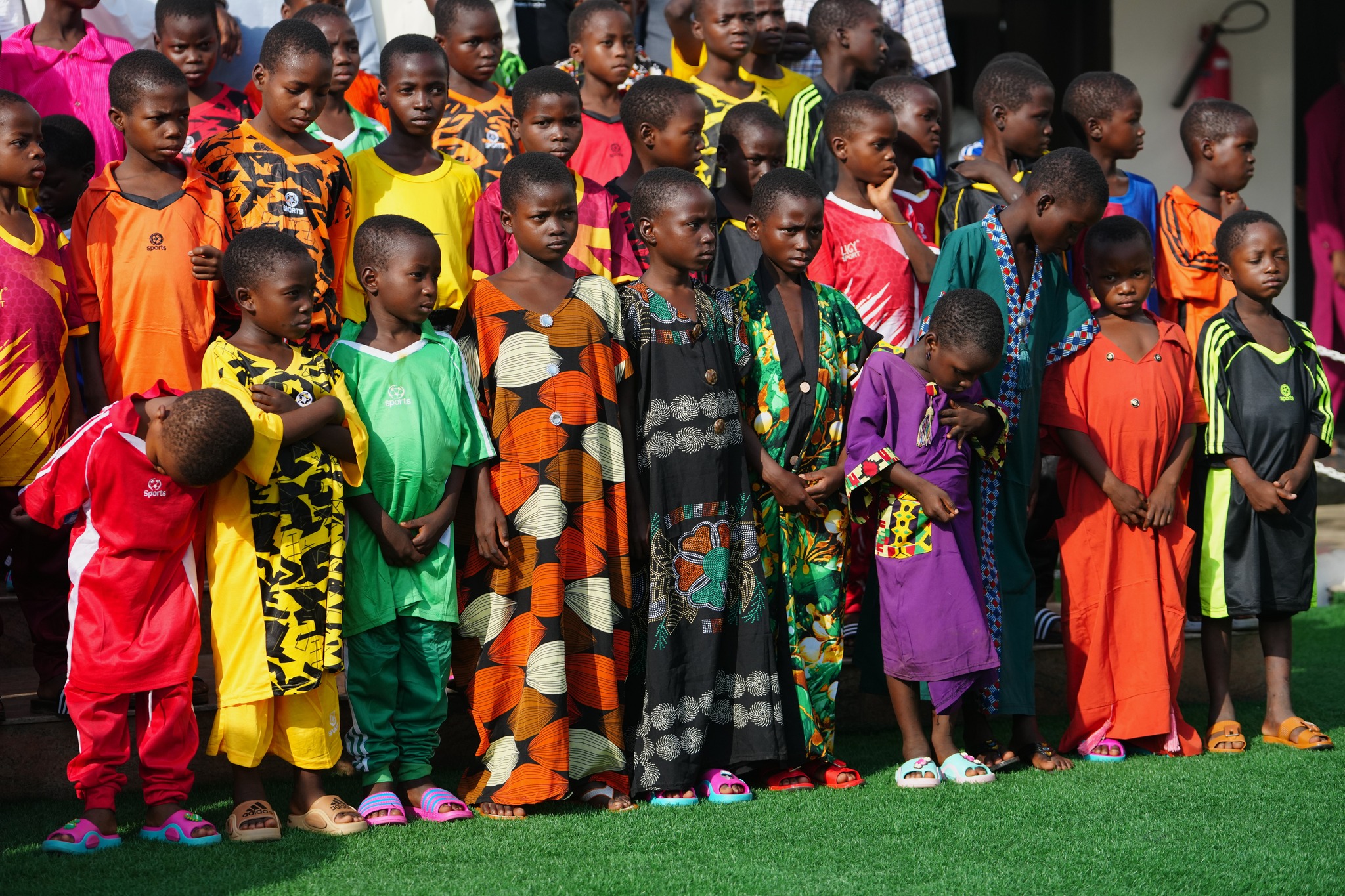 Freed students of St. Mary’s Catholic School in the Papiri community pose for photographs upon their arrival at the government house, in Minna, Nigeria, Monday, Dec. 22, 2025. (AP Photo/Sunday Alamba)