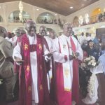 Aba (r), with Sunday Onuoha, dancing during the thanksgiving procession at the Methodist Cathedral of Unity, Wuse Zone 3, Abuja.