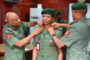 Army Spokesperson, Colonel Appolonia Anele decorated by senior military officer of the Nigerian Army