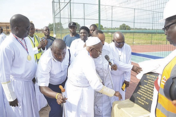 Baba Aladura Alogbo; Pro. Samaye (right) and Apostle Awode (left) and others, during the commissioning of the lawn tennis court