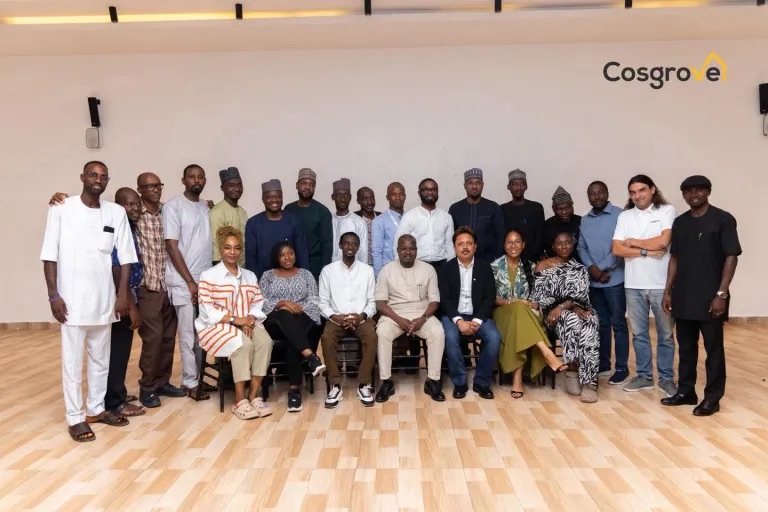 Chairman:Chief Executive Officer, Cosgrove Investment Limited, Mr. Umar Abdullahi OFR (seated in the middle) flanked on both sides and around by management staff of the organisation.