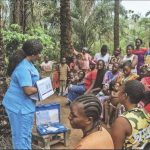 Community women paying attention during an enlightenment