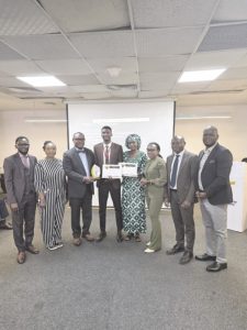 L-R- Akeem Ogunseni, Audrey Obidike; Temitope Samagbeyi; Korede Titiloye, winner of 2005 YTPY and his mother; Jane Onobhayedo; Oluwabusiyo Layade and Kayode Faboyede, at the ceremony.