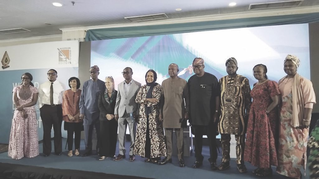 Panelists in a group photohragh during the symposium