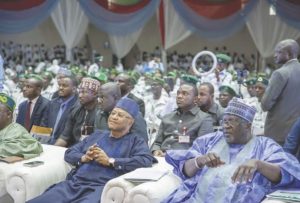 Sani (sitting middle of first row) at the Nigeria Aid group of JNI