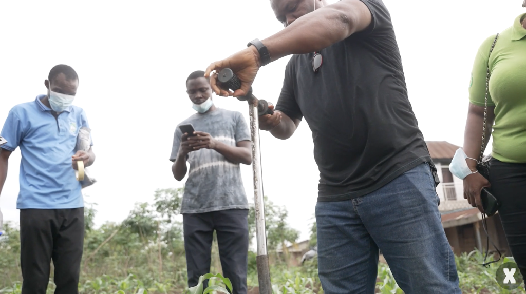 A team of Nigerian scientists led by Dr. Gilbert Adie at the University of Ibadan sampled soil and dust near battery recycling factories in Ogijo. (Image from video by Taylor Turner and Grace Ekpu for The Examination)