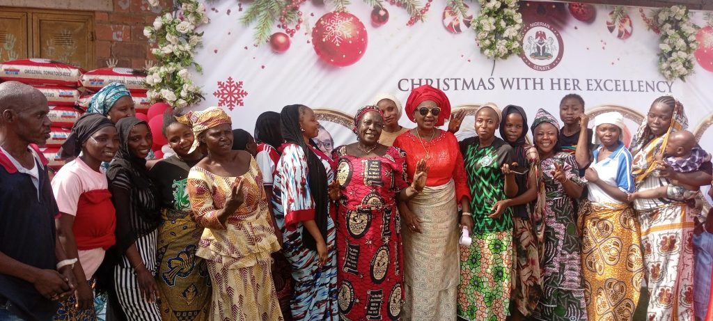 Sen. Banigo with some of the IDPs on Christmas Day in Abuja