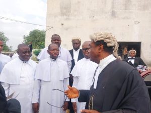 Senor lawyers and clerics after the court session