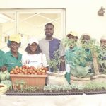 Some beneficiaries with their farm produce