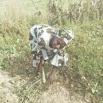 Talatu working on her farm