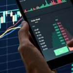 Crypto,Trader,Investor,Broker,Holding,Finger,On,Buy,Or,Sell