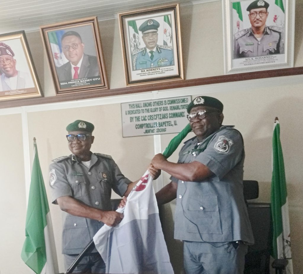 L- R: Outgoing Area Comptroller AGC Chukwudi Ogbonna handing over to Compt. Momodu Dauda at the customs house in Calabar