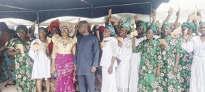 •President of Goldcrest Family Centre Reverend Agatha Chukwura, Chairman of Goldcrest Family Centre,Dr.Seyinde Fadeni and the widows as they displayed their cash gifts at the event.