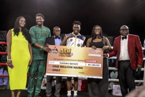 •The “Smiling Assassin” with his Best Boxer of the Night N1m cheque