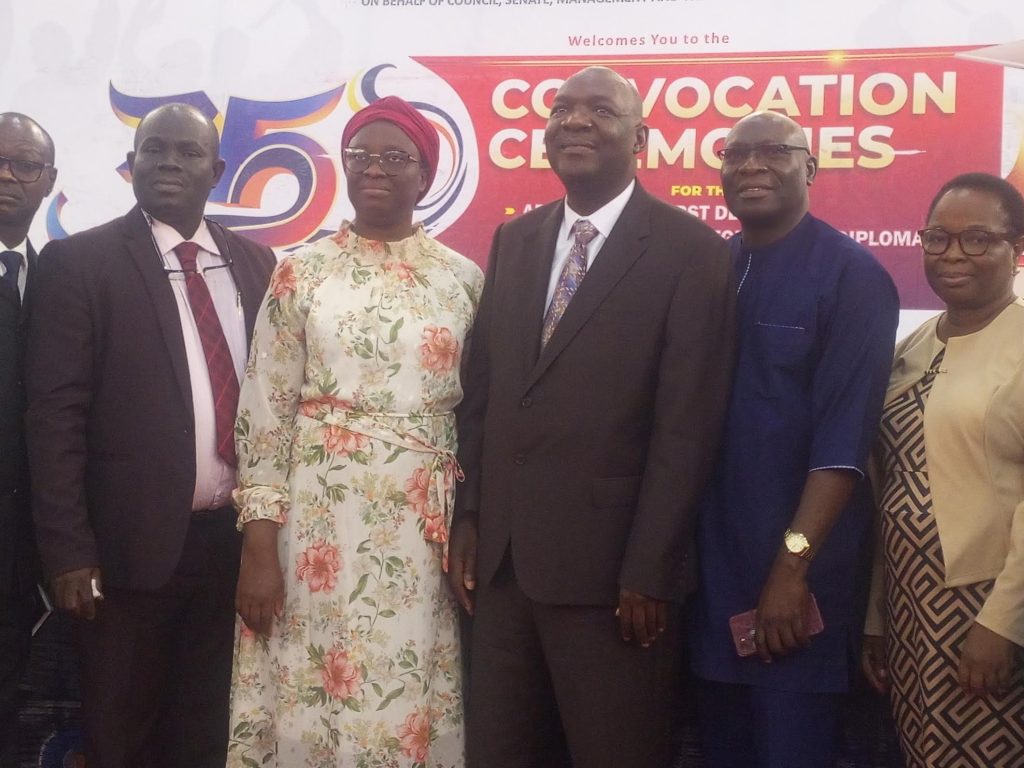 Prof. Agboola (middle) flanked by OOU principal officers