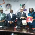 Prof. William (2nd right) and Prof. Ogunsola (right) exchange signed MOU. Education minister, Dr. Alausa (2nd left) and Prof. Ribadu (left) watch