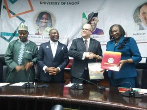 Prof. William (2nd right) and Prof. Ogunsola (right) exchange signed MOU. Education minister, Dr. Alausa (2nd left) and Prof. Ribadu (left) watch