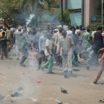 Nigerian police fire tear gas at people protesting the recent mass evictions and demolition of their homes in Makoko and other communities in Lagos, Nigeria, Wednesday, Jan. 28, 2026.  Sunday Alamba – AP