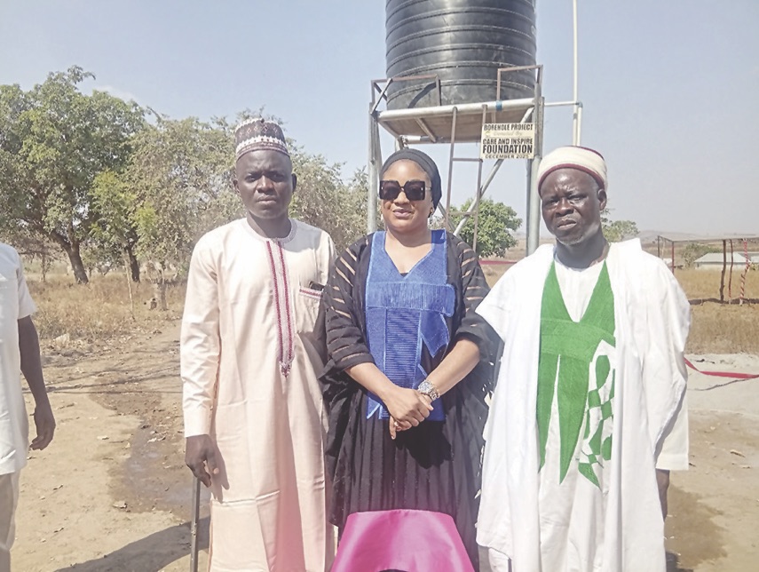 Adejoh (middle) flanked by community leaders