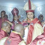 Archbishop Josephson laying hands on the newly ordained Bishops