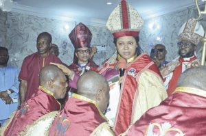 Archbishop Josephson laying hands on the newly ordained Bishops