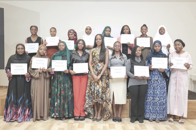 Dr Teniola Saraki and beneficiaries during the award presentation in Abuja.